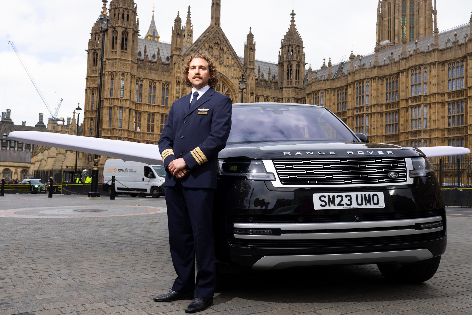 Source: David Parry / PA News A pilot stands in front of a winged car outside the Houses of Parliament. 